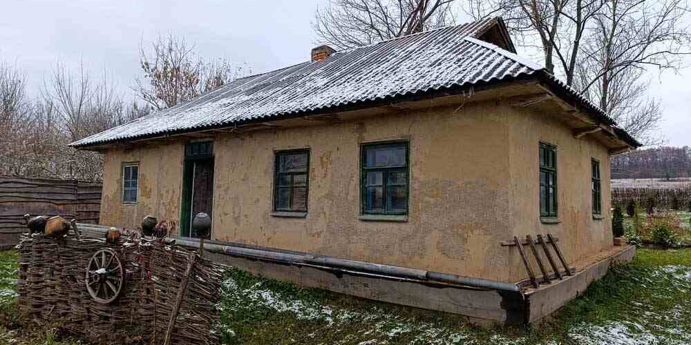 A picture of an old home during winter A picture of an old home during winter